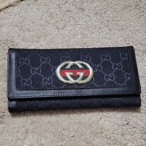 Gucci Black Wallet with Red Stripe and Silver Emblem